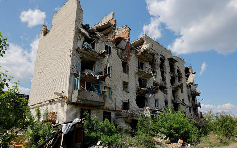 A view shows an apartment block destroyed in the course of Russia-Ukraine conflict - Alexander Ermochenko/REUTERS