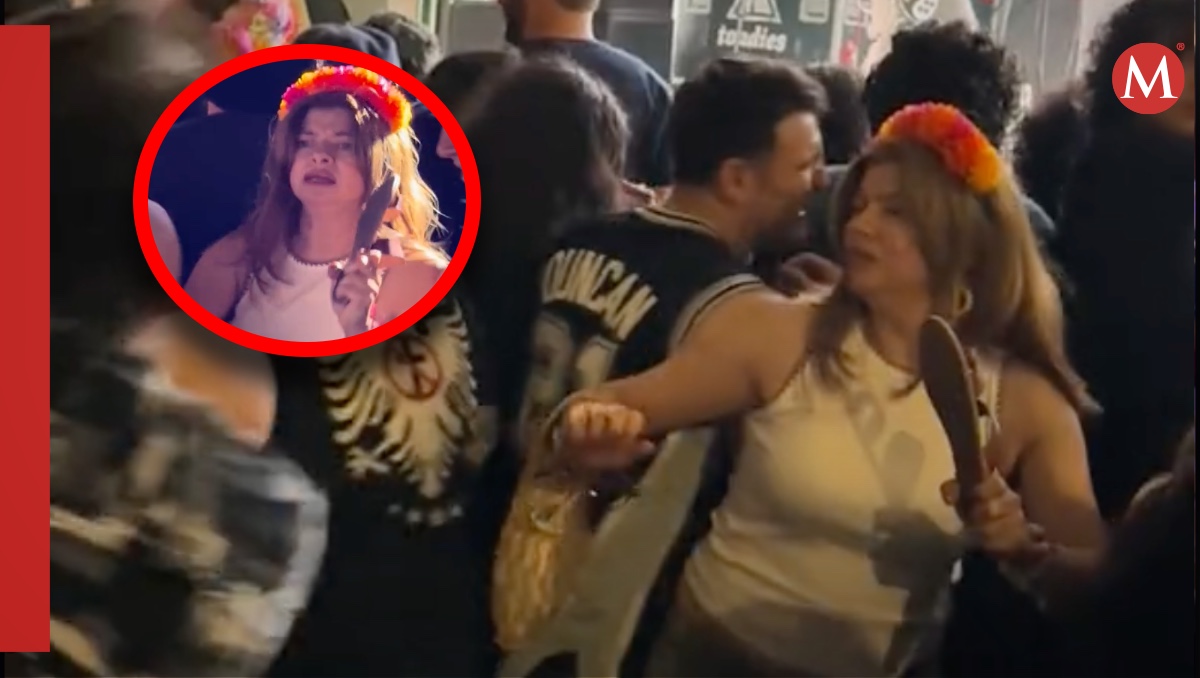 señora se protege con su chancla en medio de un 'slam' metalero y se vuele viral | video