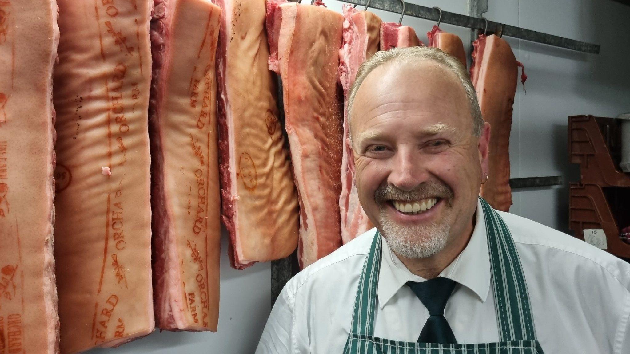 long-serving butcher hangs up his apron