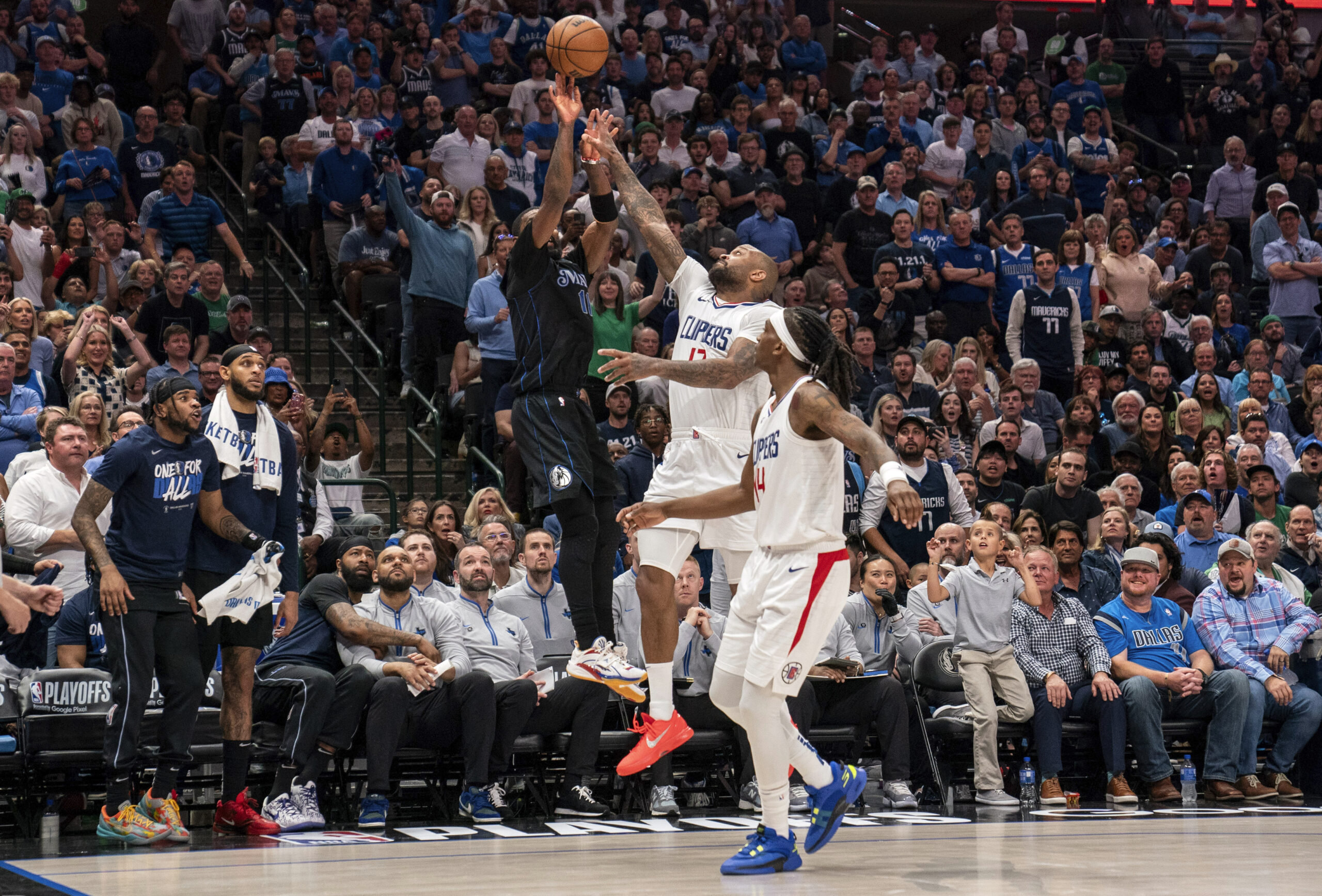 doncic, irving carry mavericks past clippers and into 2nd round