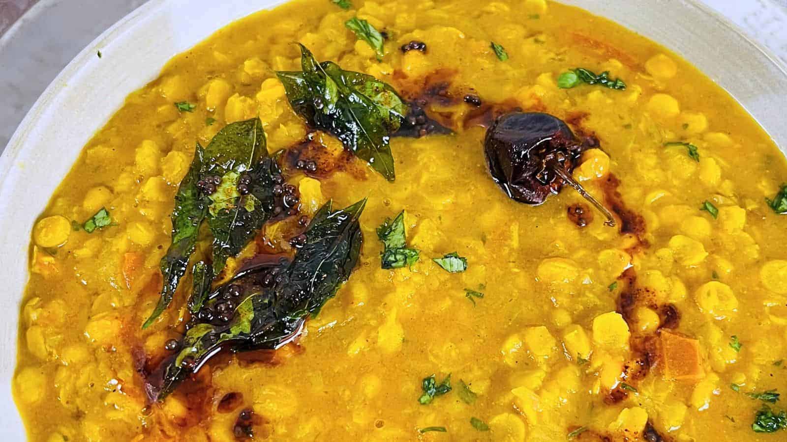 <p>A hearty, nutritious lentil dish that comforts and satisfies with rich flavors. A staple for its simplicity and taste, made easier with an Instant Pot. This dal shows the wholesome deliciousness of legumes, transformed into a beloved dish. Instant Pot Chana Dal is a testament to the power of simple, flavorful cooking.<br><strong>Get the Recipe: </strong><a href="https://easyindiancookbook.com/chana-dal/?utm_source=msn&utm_medium=page&utm_campaign=">Instant Pot Chana Dal</a></p> <div class="remoji_bar">          <div class="remoji_error_bar">   Error happened.   </div>  </div> <p>The post <a href="https://fooddrinklife.com/travel-to-india-in-a-bite/">Travel to India in a bite! 19 mind-blowing recipes! Authentic flavors, right here!</a> appeared first on <a href="https://fooddrinklife.com">Food Drink Life</a>.</p>