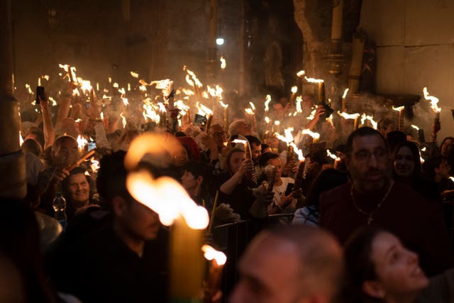 orthodox worshippers greet ancient ceremony of the holy fire in jerusalem