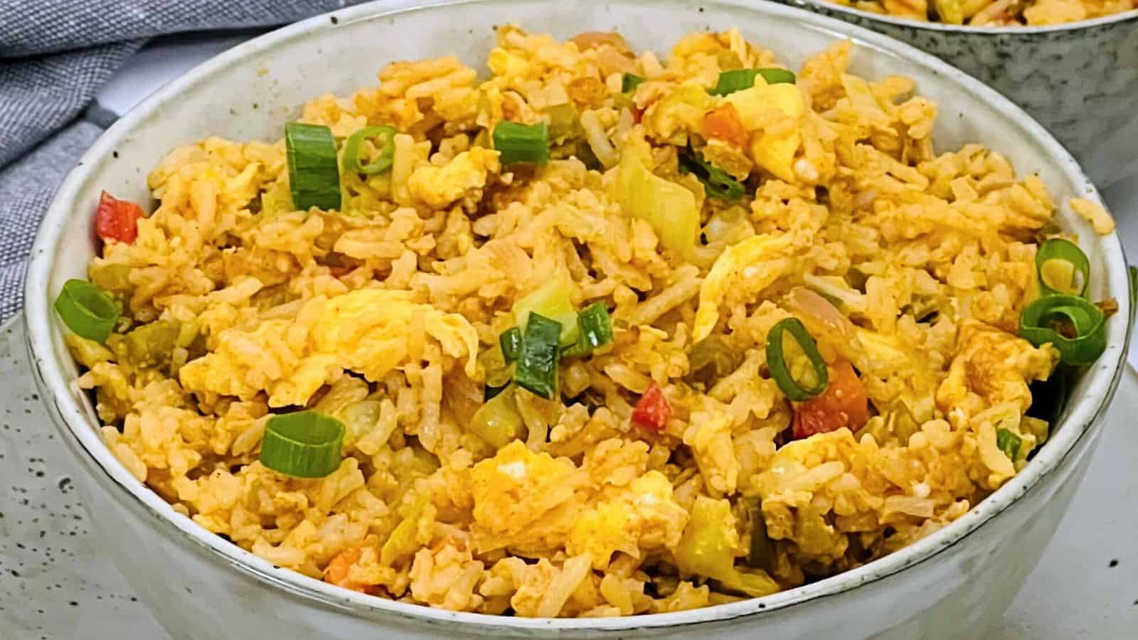 <p>Combine fluffy rice with the richness of eggs and a hint of Indian spices for a simple yet satisfying dish. It’s a quick fix for hunger pangs and a reliable crowd-pleaser. Bringing a touch of India to a global favorite, this comfort food speaks a universal language. Egg Fried Rice is a testament to simple, delicious meals.<br><strong>Get the Recipe: </strong><a href="https://easyindiancookbook.com/egg-fried-rice/?utm_source=msn&utm_medium=page&utm_campaign=">Egg Fried Rice</a></p>