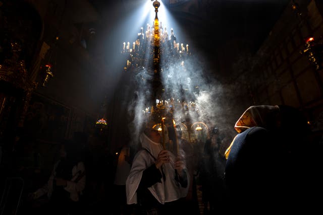 orthodox worshippers greet ancient ceremony of the holy fire in jerusalem