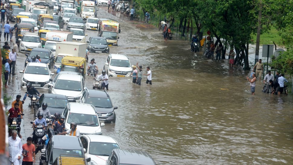 In Pics: Severe Waterlogging, Traffic Jams As Heavy Rainfall Brings ...