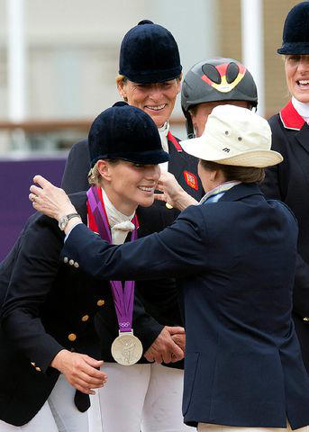 ADRIAN DENNIS/AFP/Getty Zara Phillips receives her silver medal from her mother Princess Anne for the team equestrian eventing at the 2012 London Olympics on July 31, 2012.