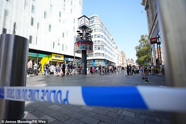 Schoolgirl 11 and woman 34 stabbed in London s Leicester Square