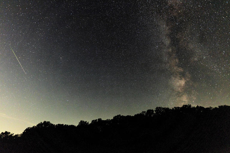  A meteor streaks across the sky during the Perseids meteor shower peak at Pedernales Falls State Park, on Aug. 12, 2024, in Johnson City, Texas. / Credit: RICK KERN / Getty Images