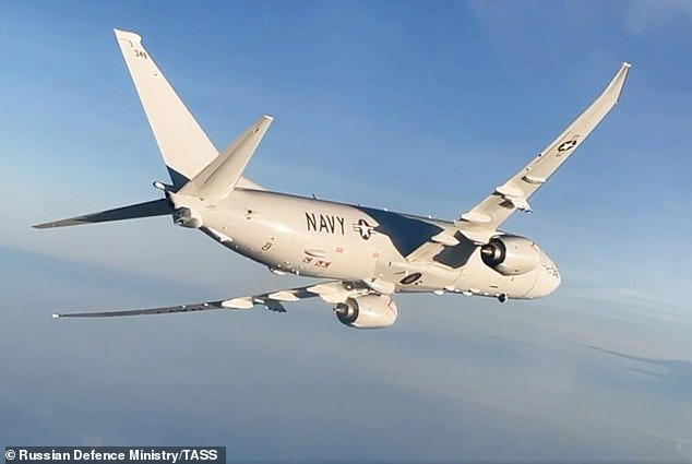 Above, a Boeing P-8 Poseidon maritime patrol plane of the US Air Force flies over neutral waters of the Black Sea - captured on video by Russian military forces