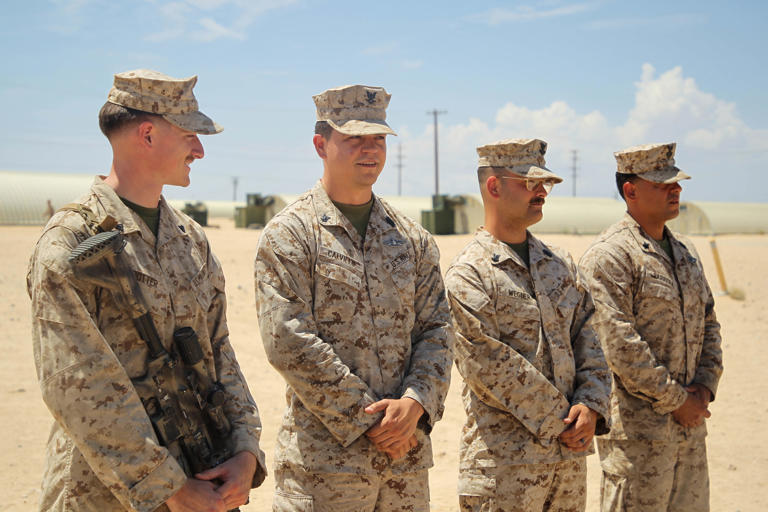 Sailors, Marine receive award for saving Marine's life