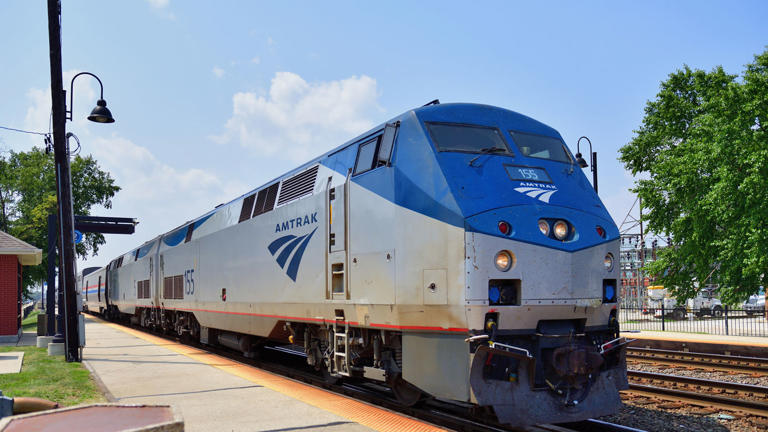 Amtrak train parked at a station.