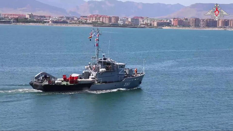 An image taken from a handout footage released by the Russian defence ministry on 30 July 2024, shows the Russian Caspian Sea flotilla during naval drills.