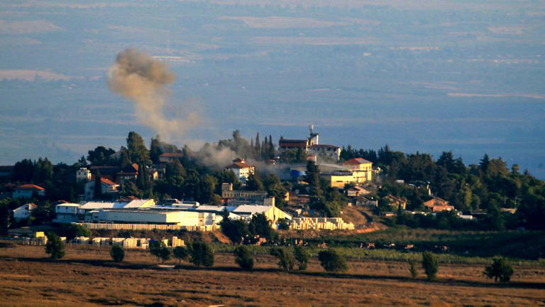 Smoke billows at the Israeli-Lebanon border from the site of a rocket fired from the Lebanese side, towards the Israeli village of Metullah on Saturday. - AFP/Getty Images