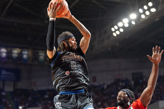 La Familia's Willie Cauley-Stein (2) grabs the rebound against The Ville's Montrezl Harrell (5) during their game on Monday, July 29, 2024 at Freedom Hall in Louisville, Ky. during the quarter finals of The Basketball Tournament.