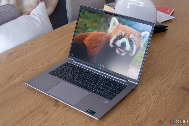 Angled view of the HP ZBook Firefly 14 G11 showing the Windows 11 desktop