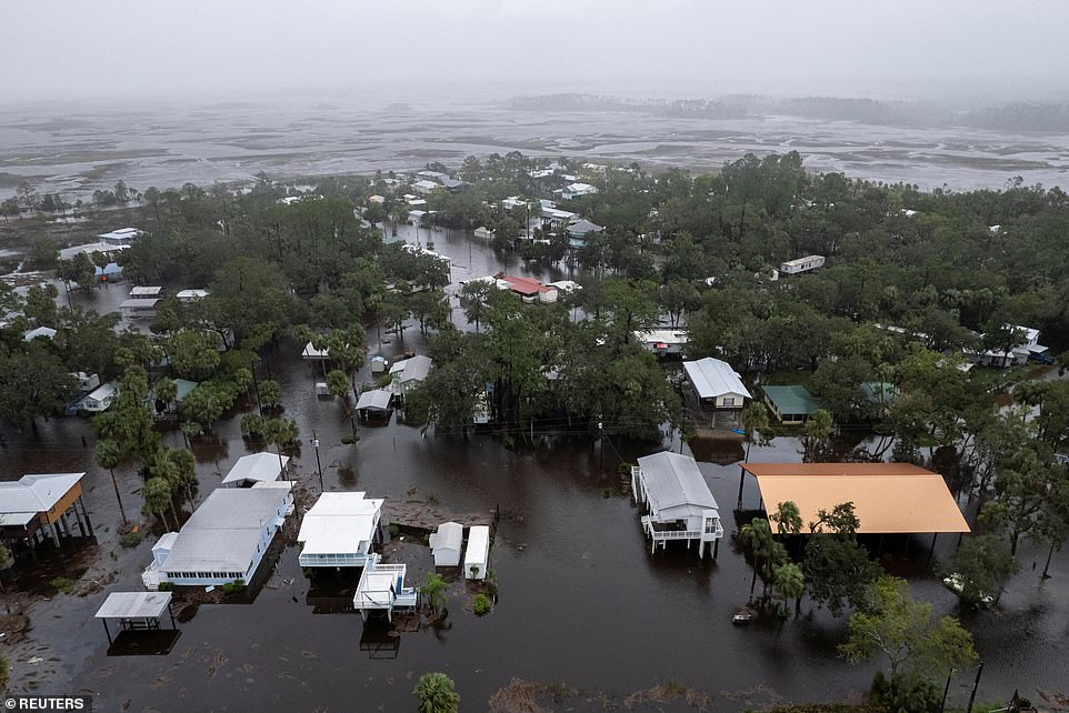 Six Dead After Tropical Storm Debby Brings Torrential Rains & Flooding