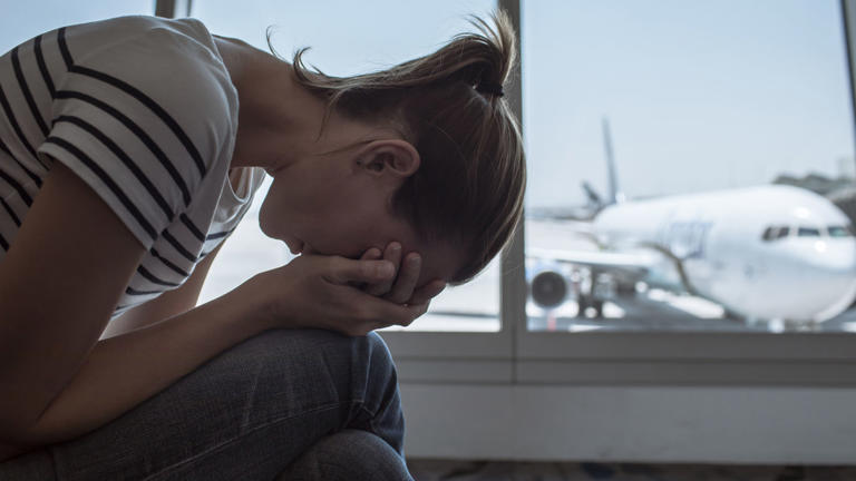 Stressed out traveler at the airport