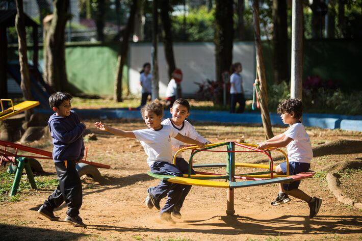 Crianças da pré-escola brincam em escola municipal no Paraíso, zona sul Foto: Tiago Queiroz/Estadão