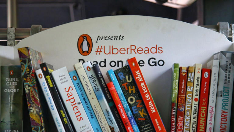 Uber wants its passengers to ditch the phone and pick up a book when travelling