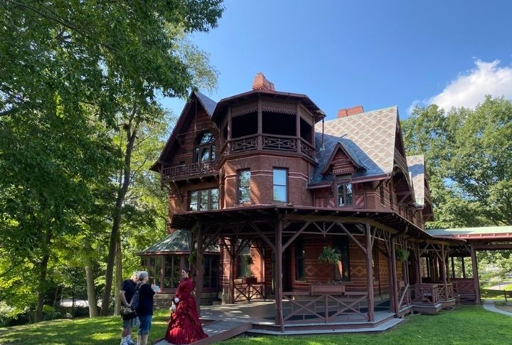 <p>The Mark Twain House & Museum in Hartford, Connecticut, was Samuel Clemens’ home from 1874 to 1891. Designed by Edward Tuckerman Potter in American High Gothic style, it offers guided tours daily, showing Twain’s life and works. Plan ahead—tours often sell out, and the museum is closed on major holidays.</p>