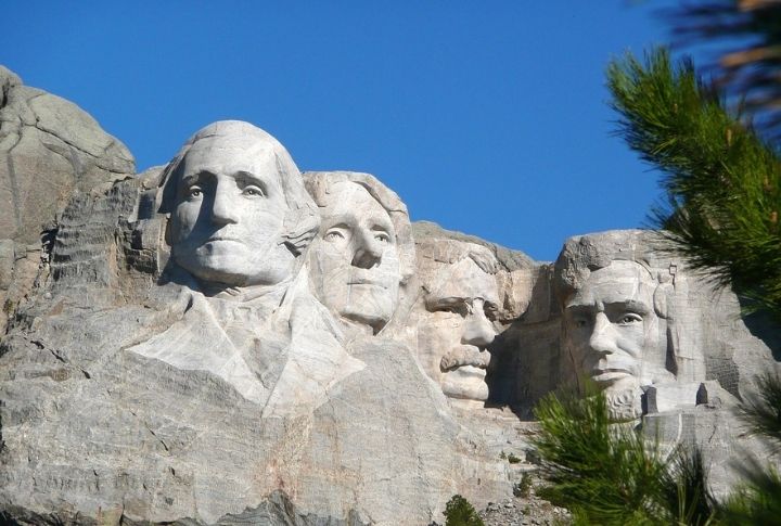 <p>Mount Rushmore National Memorial, carved from granite in South Dakota’s Black Hills, shows the 60-foot-tall faces of presidents George Washington, Thomas Jefferson, Theodore Roosevelt, and Abraham Lincoln. Completed in 1941 by Gutzon Borglum and his son, Lincoln, this monumental sculpture also includes a museum with interactive exhibits and tours. </p>