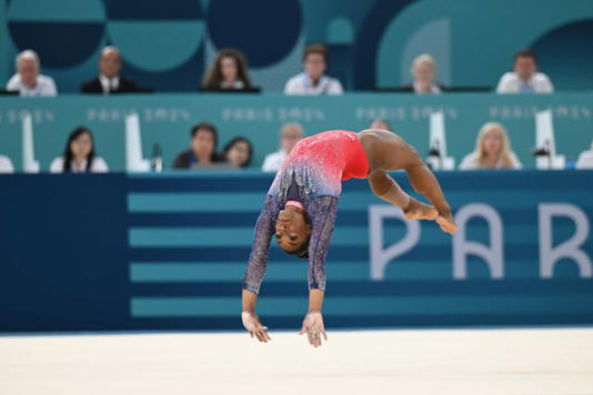 Marijan Murat/picture alliance via Getty Images Simone Biles competing at the 2024 Paris Olympics on August 05, 2024