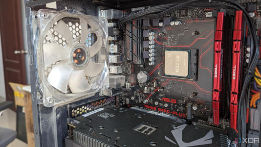 Close-up of the inside of a gaming PC showing the CPU, GPU, motherboard, and RAM