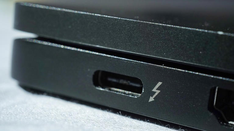 Thunderbolt 4 port on a black laptop