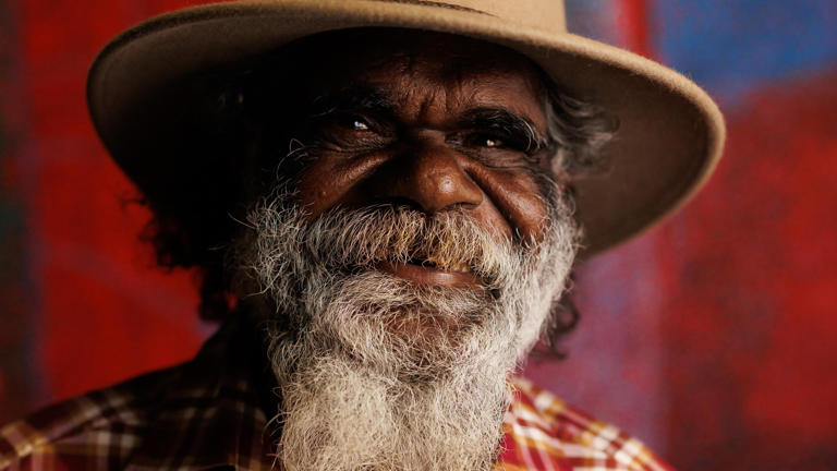 Noli Rictor has won $100,000 at the National Aboriginal and Torres Strait Islander Awards, for a painting of his Country. (Supplied: MAGNT/Charlie Bliss)