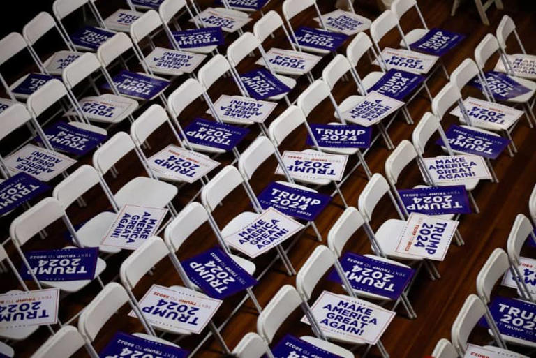 ROCHESTER, NEW HAMPSHIRE - JANUARY 21: Campaign signs for Republican presidential candidate and former President Donald Trump await supporters in their seats at the Rochester Opera House ahead of a campaign rally on January 21, 2024 in Rochester, New Hampshire. Trump is rallying three days before New Hampshire voters will weigh in on the Republican nominating race with the first-in-the-nation primary. (Photo by Chip Somodevilla/Getty Images)