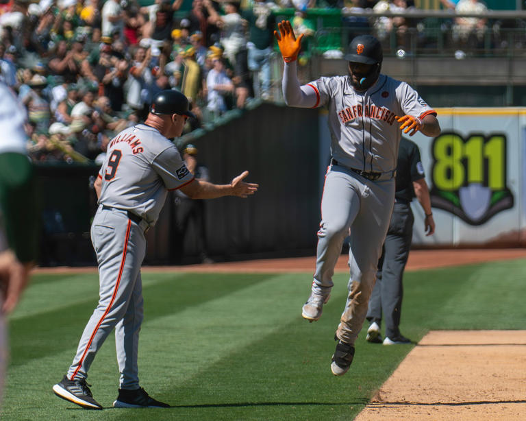 Giants go deep, top A’s in 10th inning of Bay Bridge Series finale