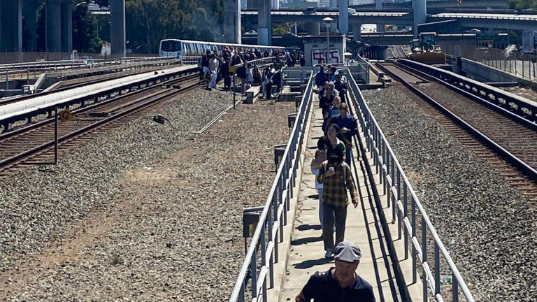 BART passengers evacuated from smoking train at MacArthur Station