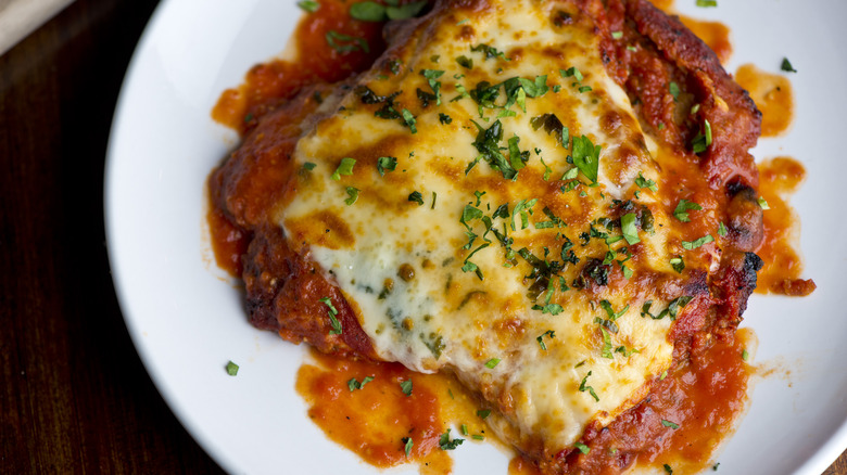 We Spoke To Chefs To Find Out Why Chicken Parmesan Always Tastes Better 