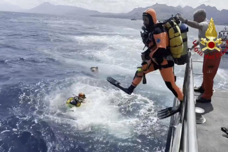 Deep seas and tight spaces impede search for 6 missing after yacht sinks off Sicily