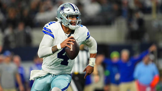 Dak Prescott #4 of the Dallas Cowboys scrambles out of the pocket during an NFL football game against the Seattle Seahawks at AT&T Stadium on November 30, 2023 in Arlington, Texas. Getty Images