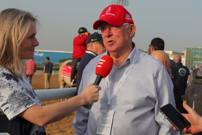 Sir Alex Ferguson talks to the press at Dubai's Meydan Racecourse in March. Photo: SCMP