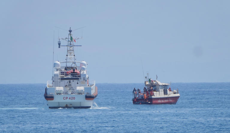 Members of the rescue team placed a body bag onto the lower half of the deck of the fire service dive team boat on the fifth day of the search and recovery operation, after the luxury yacht Bayesian sank in a storm on Monday whilst moored around half a mile off the coast of Porticello, Sicily. Picture date: Friday August 23, 2024. (Photo by Jonathan Brady/PA Images via Getty Images) (Photo: Jonathan Brady - PA Images via Getty Images)