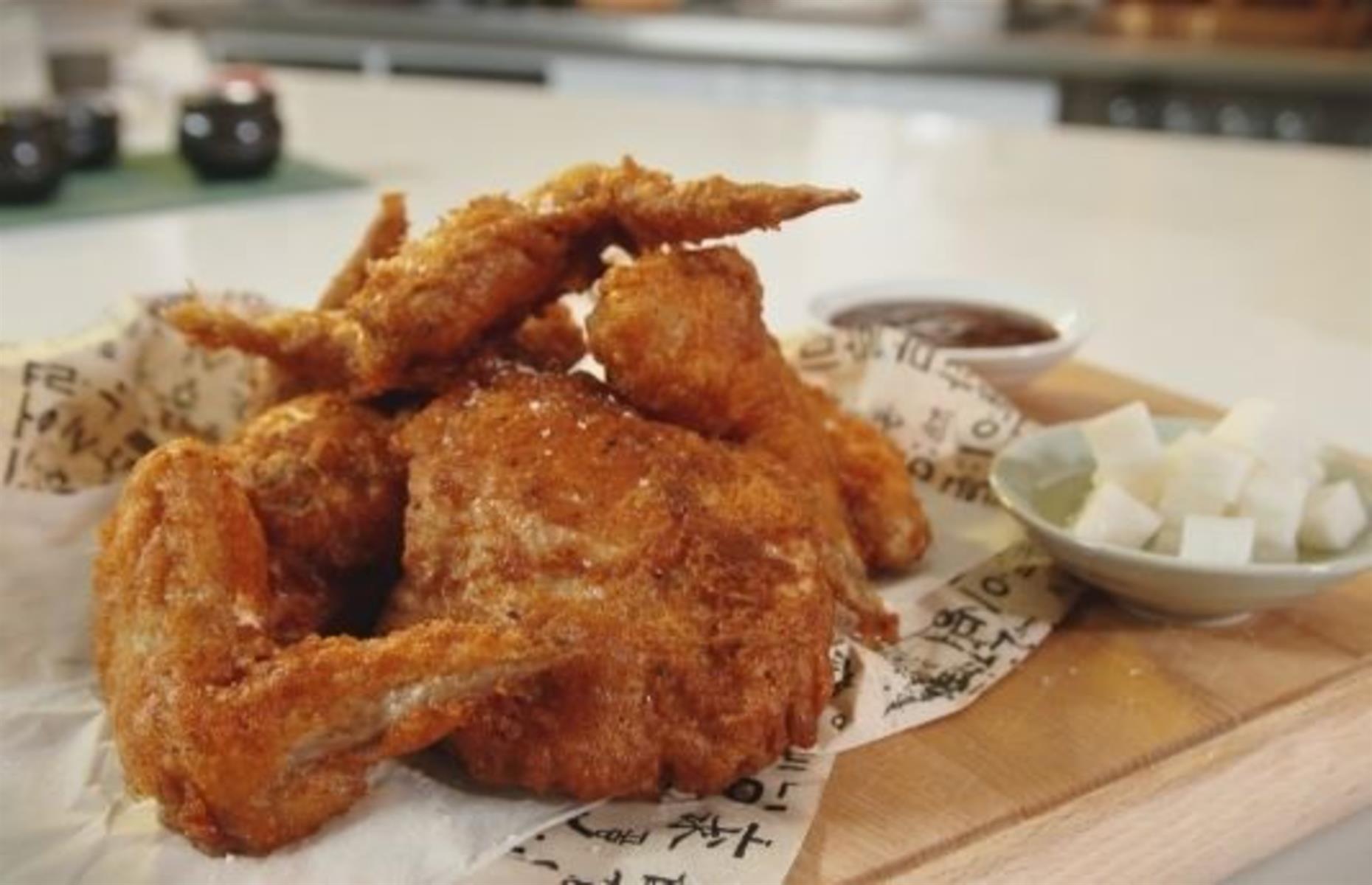 Battered Korean fried chicken wings with barbecue sauce