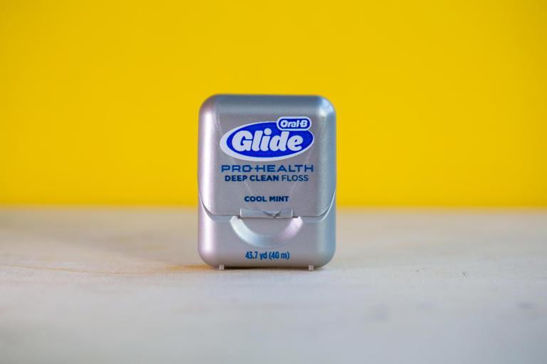 Should you floss before or after brushing 