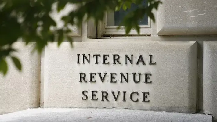 Over 800 IRS employees owe millions in back taxes after audits pushed by Ernst