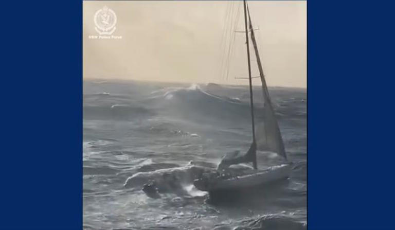 A rescue boat approaches the racing yacht, Spirit of Mateship, more than 100 miles off the Australian coast early Tuesday. ©YouTube/Guardian