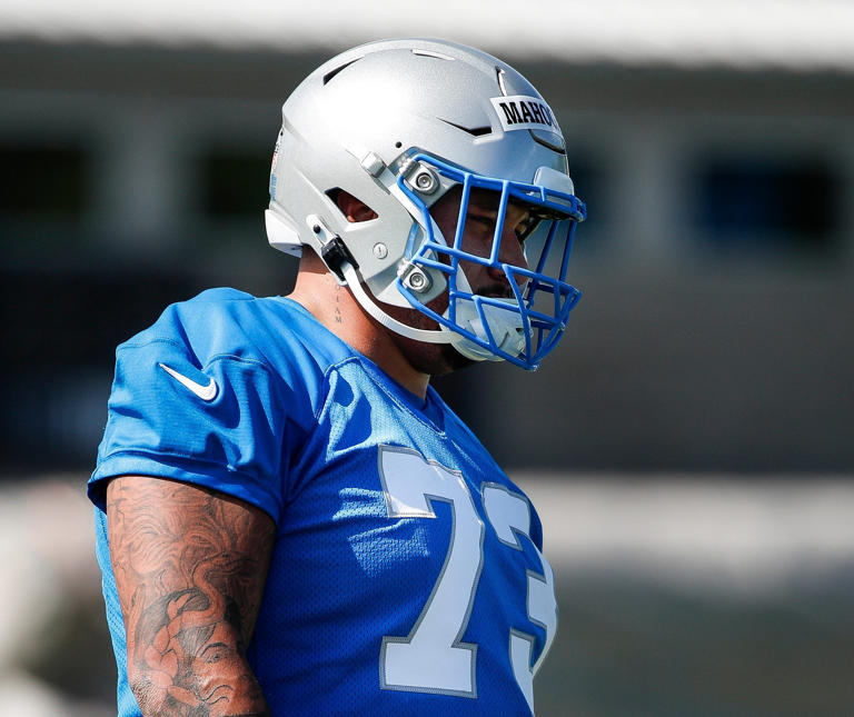 Detroit Lions offensive lineman Christian Mahogany (73) practices during rookie minicamp at Detroit Lions headquarters and practice facility in Allen Park on Friday, May 10, 2024.