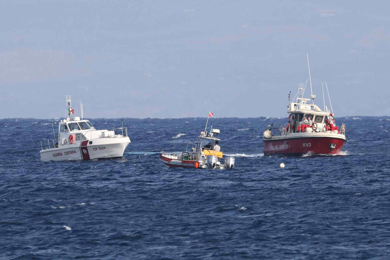 Lo Bianco/Anadolu via Getty Crews search the waters off the coast of Sicily after a yacht capsized on Monday, Aug. 19, 2024