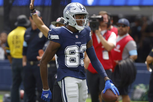 Dallas Cowboys wide receiver Jalen Brooks (83) reacts after completing a long pass play against Los Angeles Rams cornerback Cameron McCutcheon in the first quarter of a preseason game at Sofi Stadium in Inglewood, California, August 11, 2024.