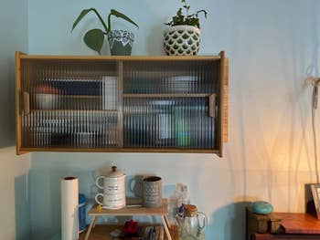 Kitchen setup with a wooden cabinet