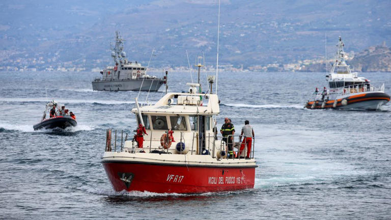 Rescue boats take part in the search operation off the coast of Porticello on Wednesday. - Louiza Vradi/Reuters