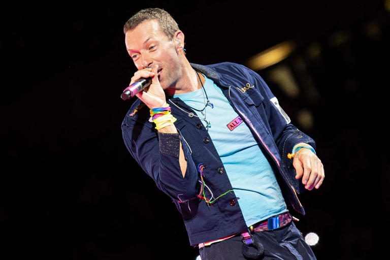 Chris Martin performs at the Ernst-Happel-Stadion in Vienna on Aug. 21, 2024.