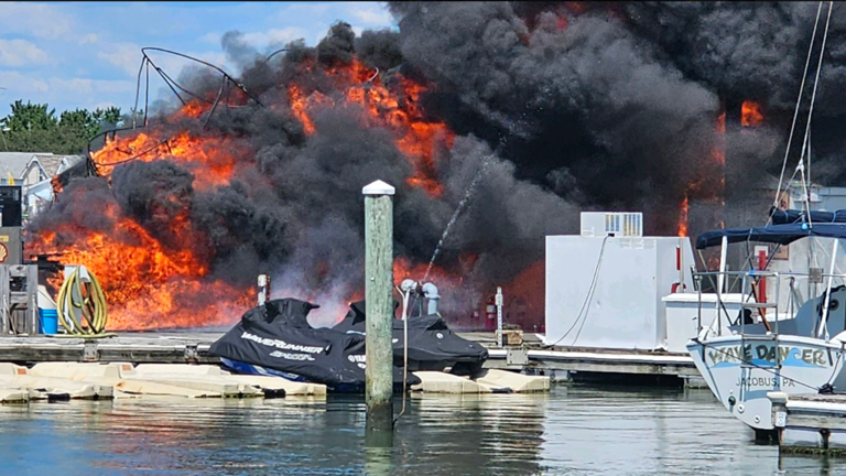 Boat catches on fire at Schooner Island Marina in Wildwood Crest, New Jersey