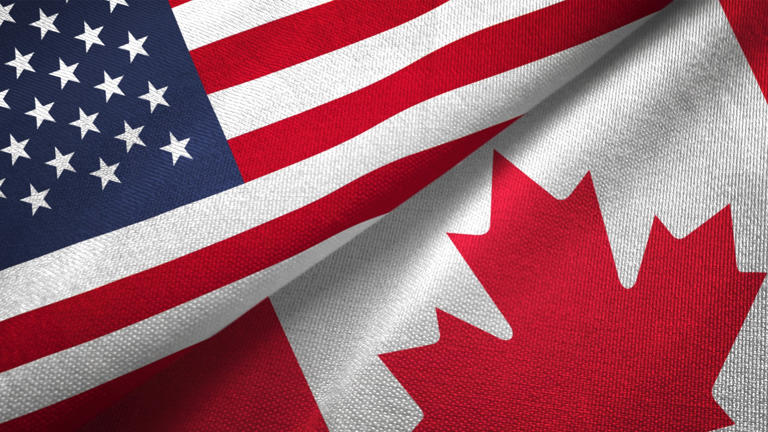 american us canadian flags_iStock-1089423322