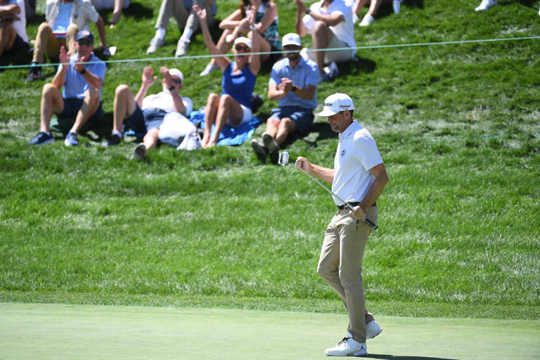 Keegan Bradley celebrates after a birdie putt on the 18th hole during the first round of the BMW Championship golf tournament at Castle Pines Golf Club. Mandatory Credit: Christopher Hanewinckel-USA TODAY Sports